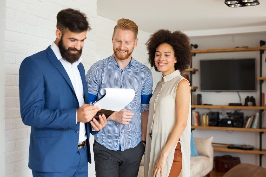 a couple buying a house