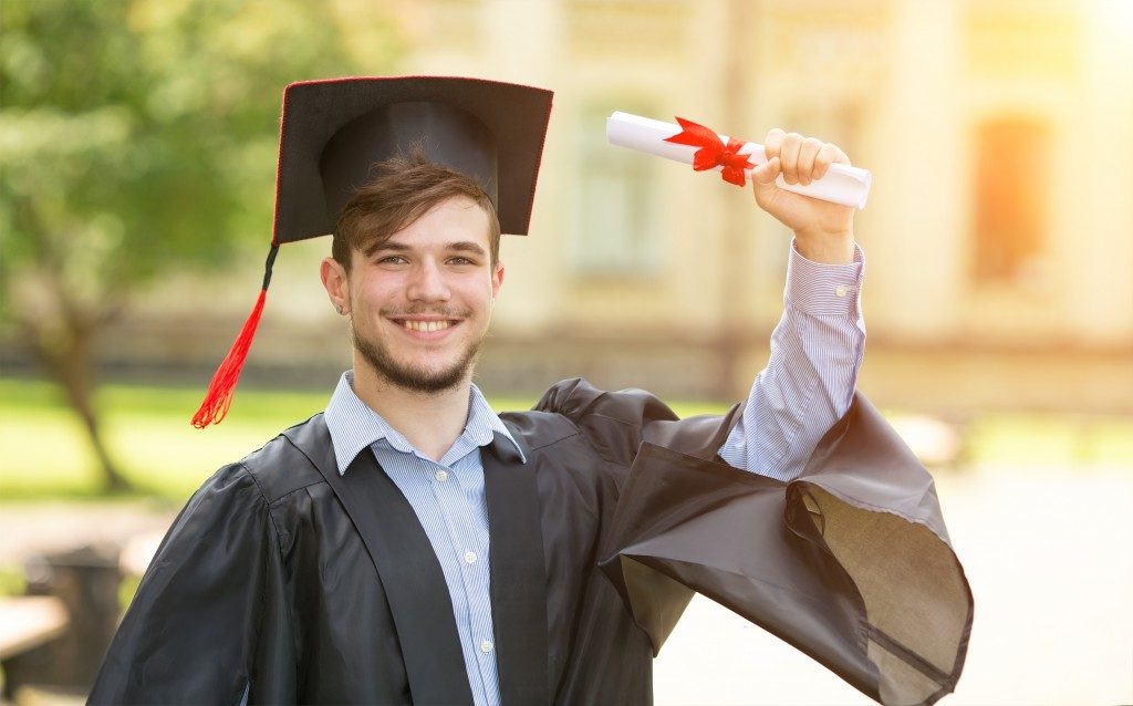 Man finishing his master's degree