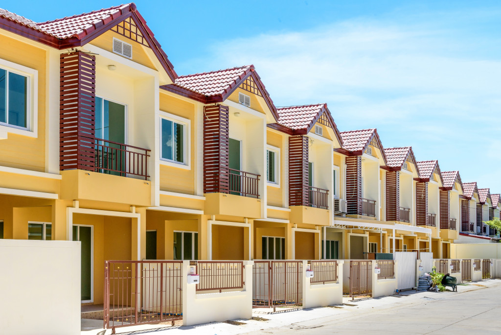 A row of newly-built townhouses for sale.