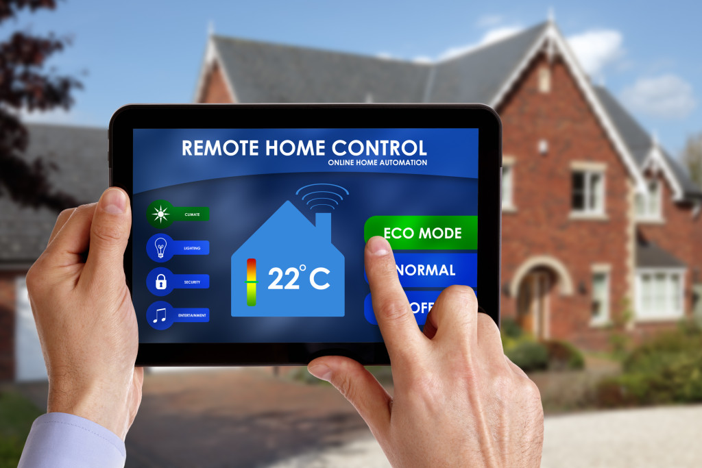A man controlling his smart home